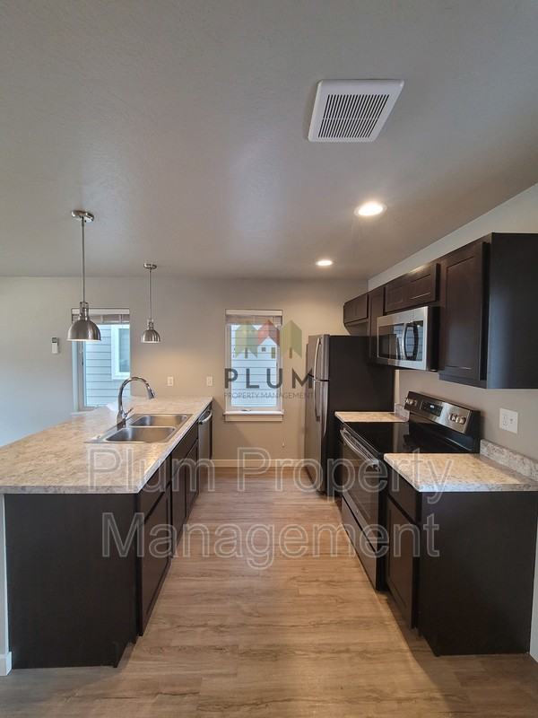 2414 Mcdonald Ave #102 - Photo 6 of 18
