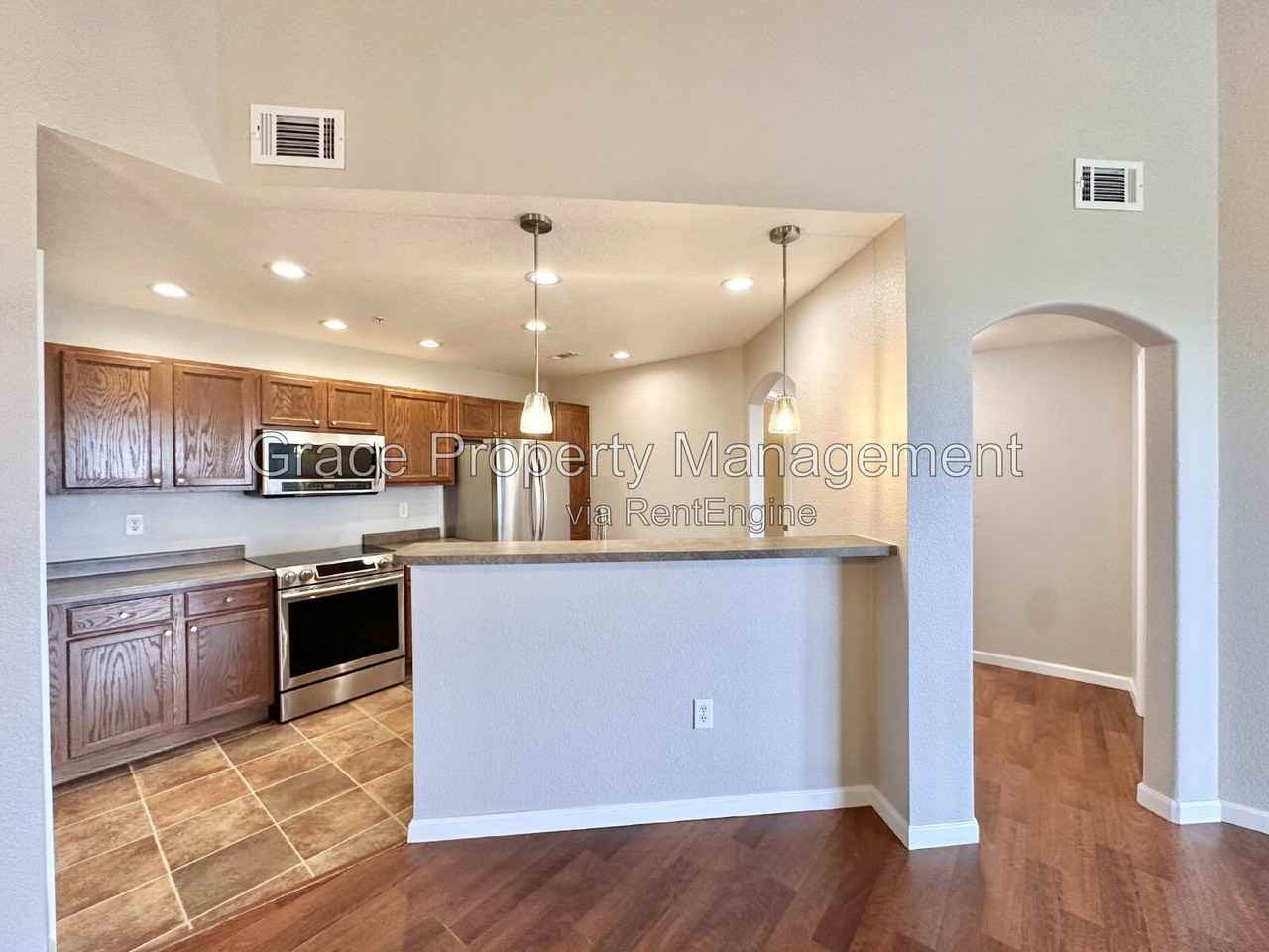 5735 N Genoa Way #306 - Photo 2 of 23