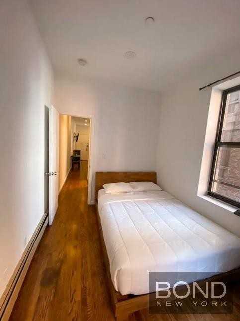 407 W 51st St - Photo 6 of 7