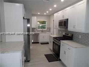 6540 W 11th Ave #0 - Photo 3 of 21