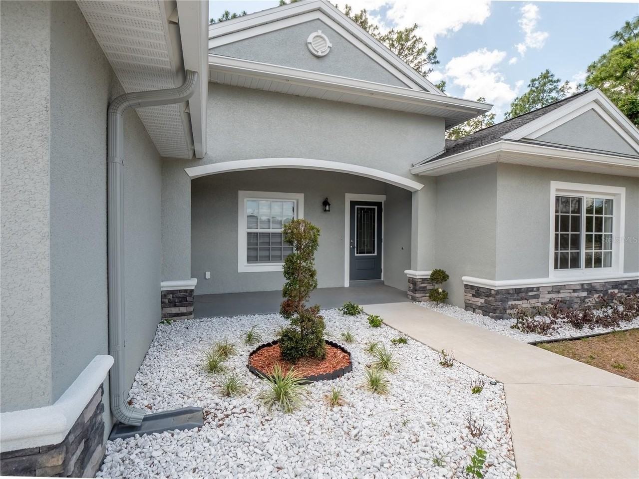 696 Marion Oaks Trl - Photo 2 of 46