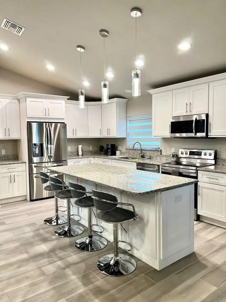 696 Marion Oaks Trl - Photo 4 of 46