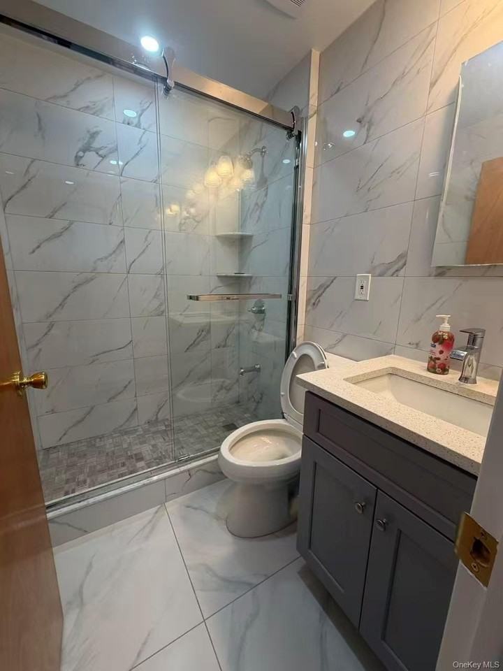 14442 Willets Point Blvd - Photo 4 of 10