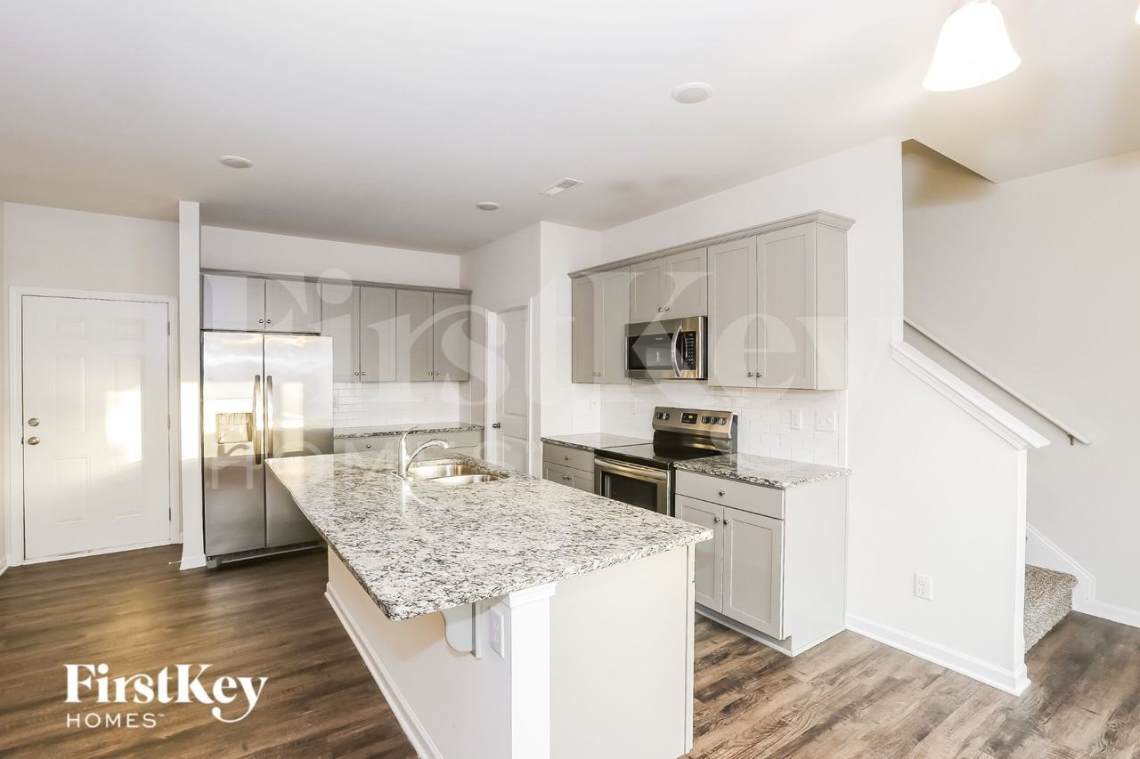 10717 Rivergate Dr Nw - Photo 6 of 16