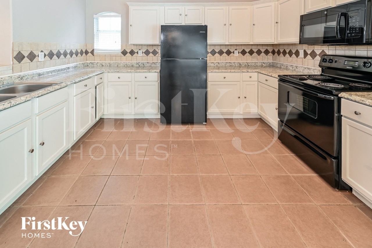 4447 Donalbain Dr - Photo 7 of 15