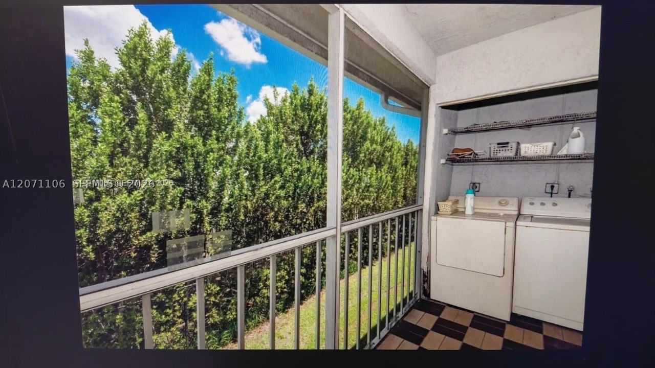 430 Ne 210th Circle Ter #201-3 - Photo 2 of 10