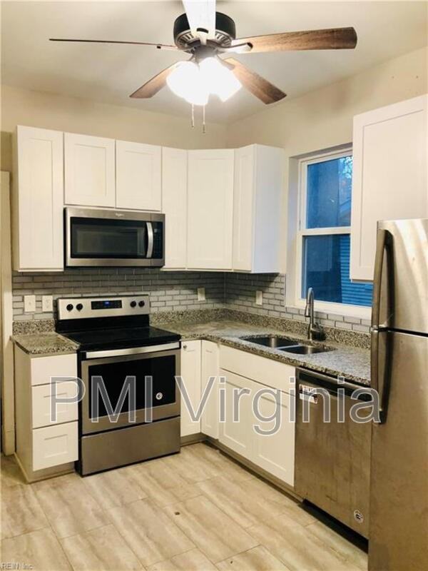 818 W 42nd St - Photo 3 of 4