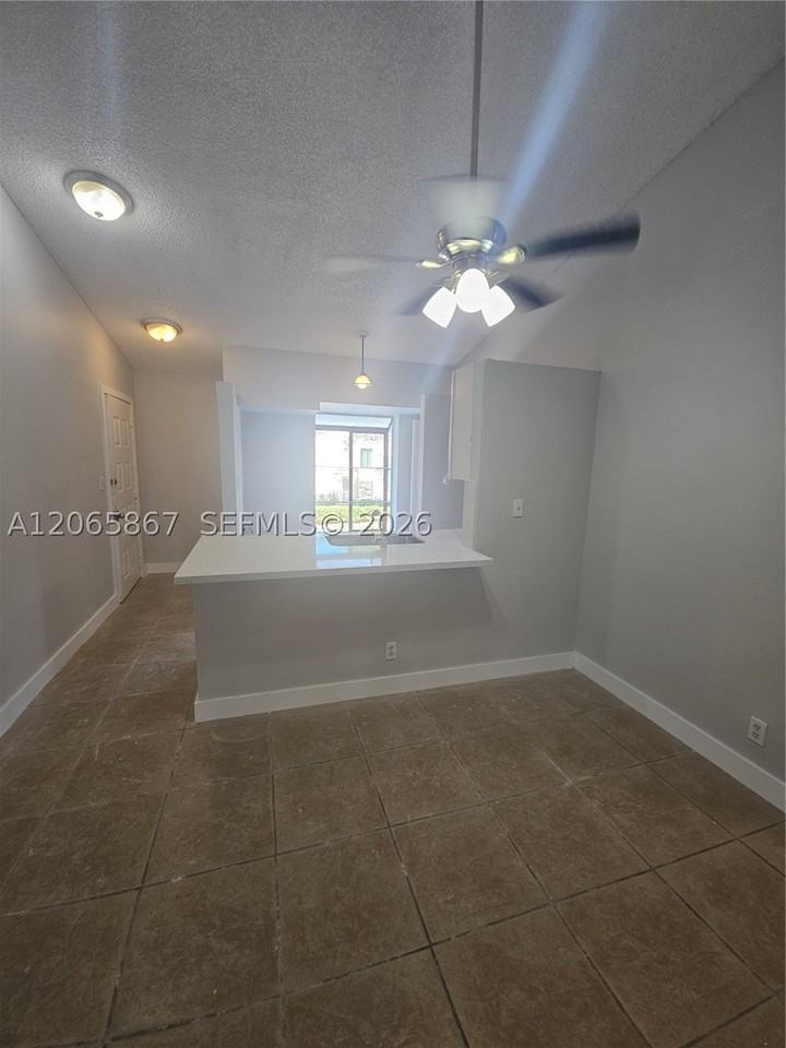 713 Gardens Dr #205 - Photo 4 of 9