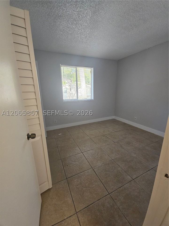 713 Gardens Dr #205 - Photo 7 of 9