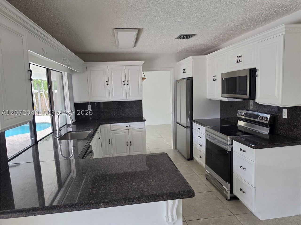 11956 Sw 97th St - Photo 4 of 5