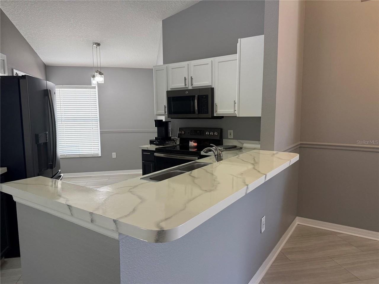 16212 Coopers Hawk Ave - Photo 4 of 15