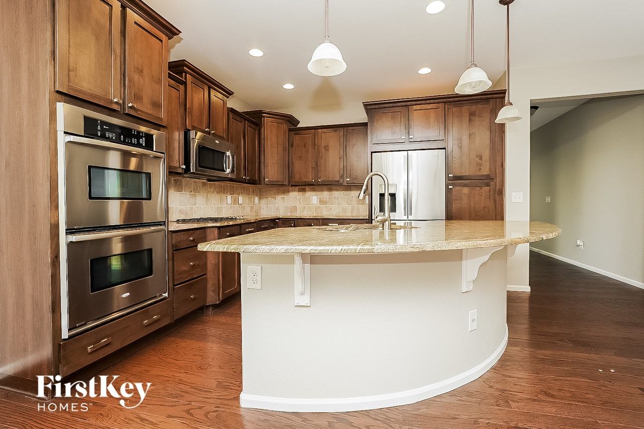 12722 E 105th Ave - Photo 5 of 15