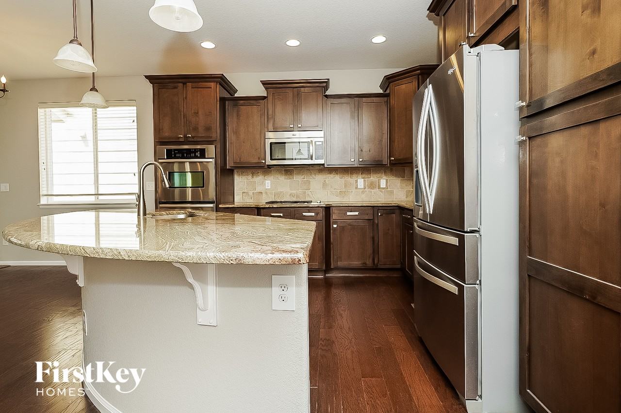 12722 E 105th Ave - Photo 6 of 15