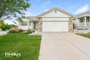 featured image of 6122 S Quemoy Ct