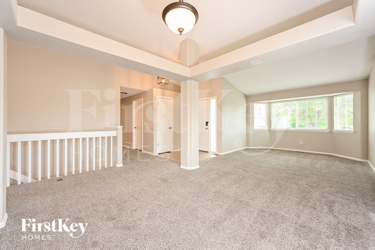 6122 S Quemoy Ct - Photo 4 of 15