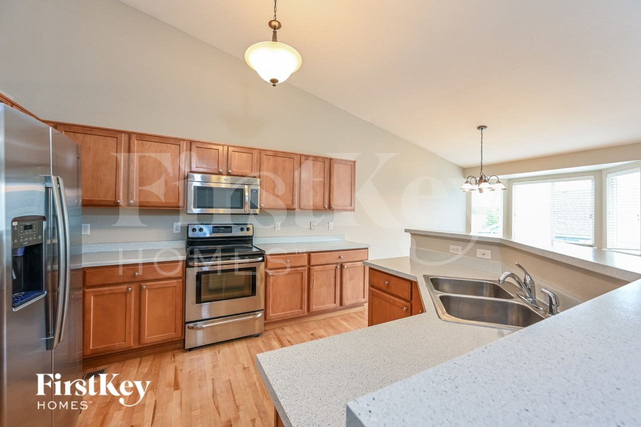6122 S Quemoy Ct - Photo 6 of 15