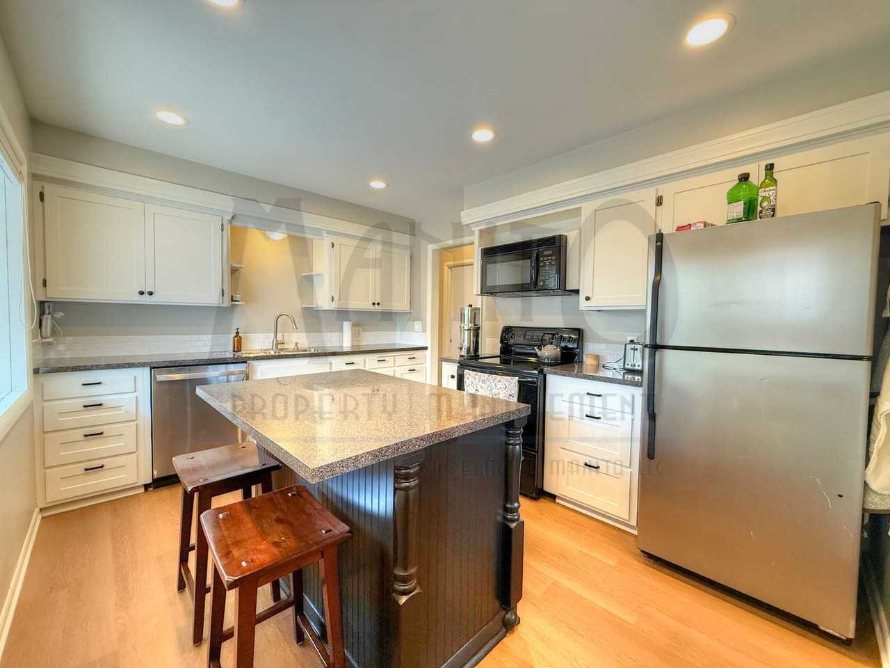 1324 E 43rd Ave - Photo 7 of 20