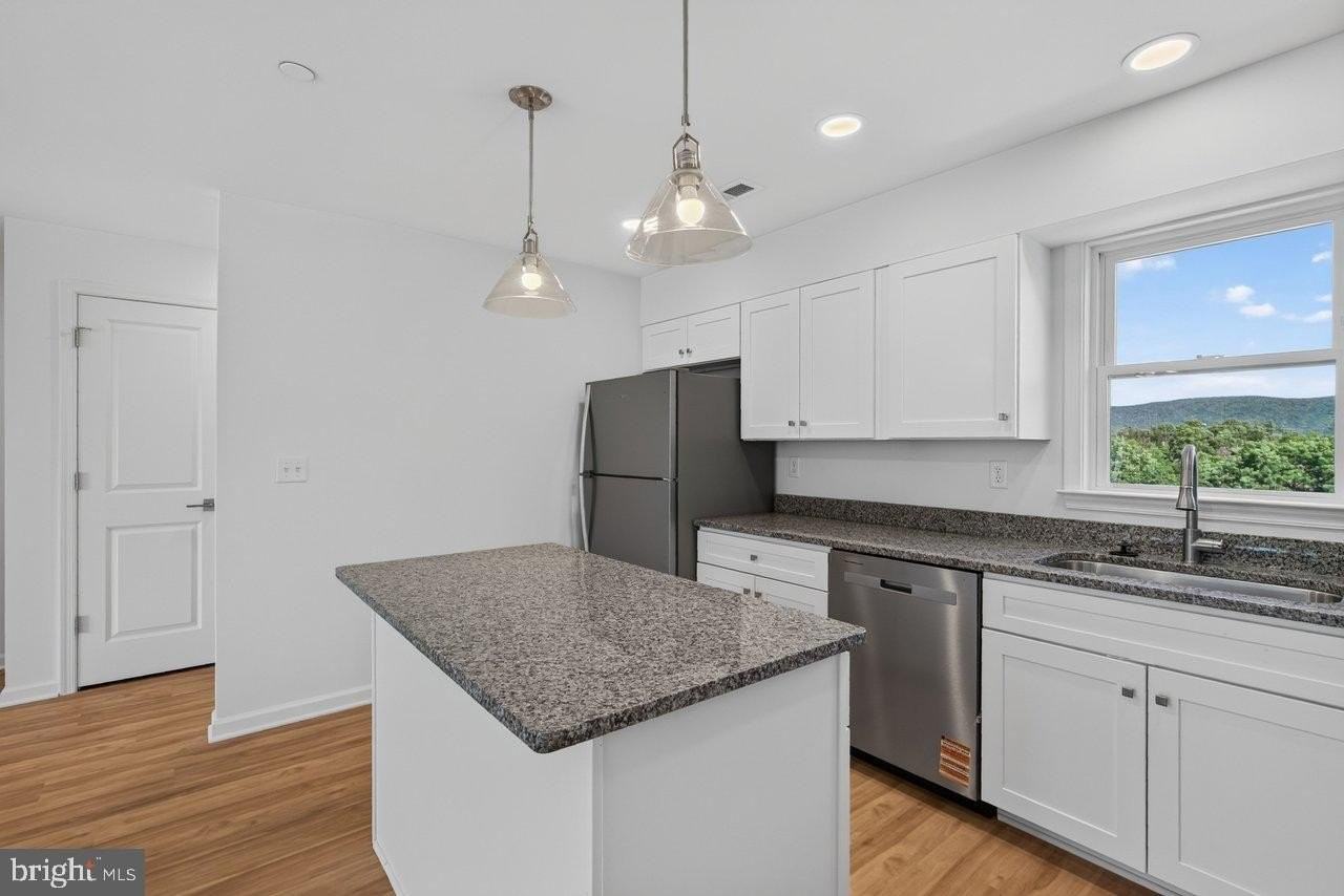 963 Woodstock Commons Pl #107A - Photo 5 of 24