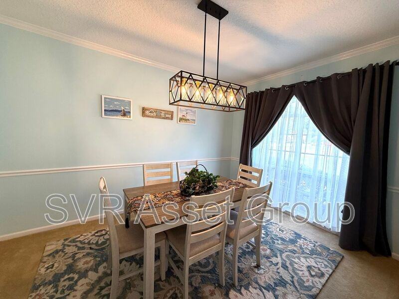 8997 Adams Walk Dr - Photo 2 of 19