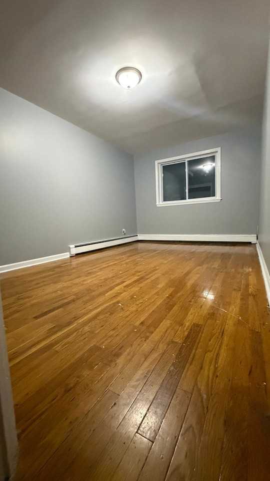 1015 E 223rd St #2 - Photo 3 of 14