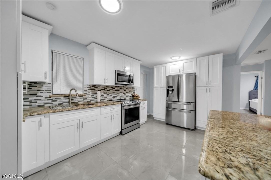 77 Glenmont Dr W - Photo 4 of 29
