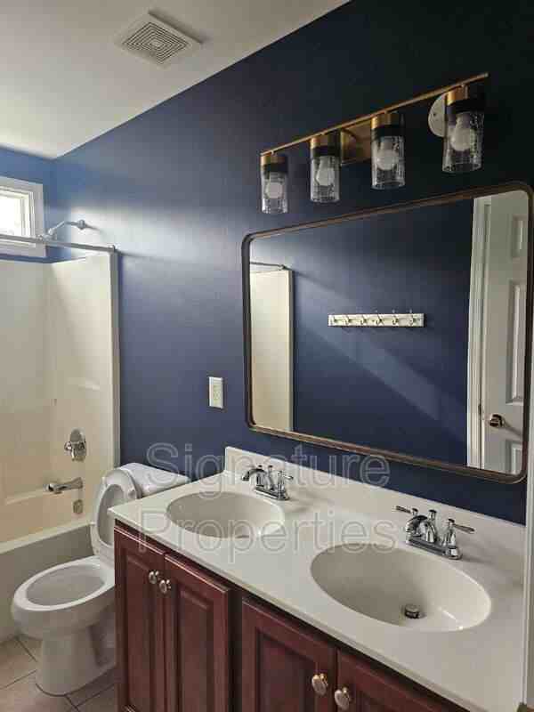 5600 Barnsley Pl - Photo 3 of 34
