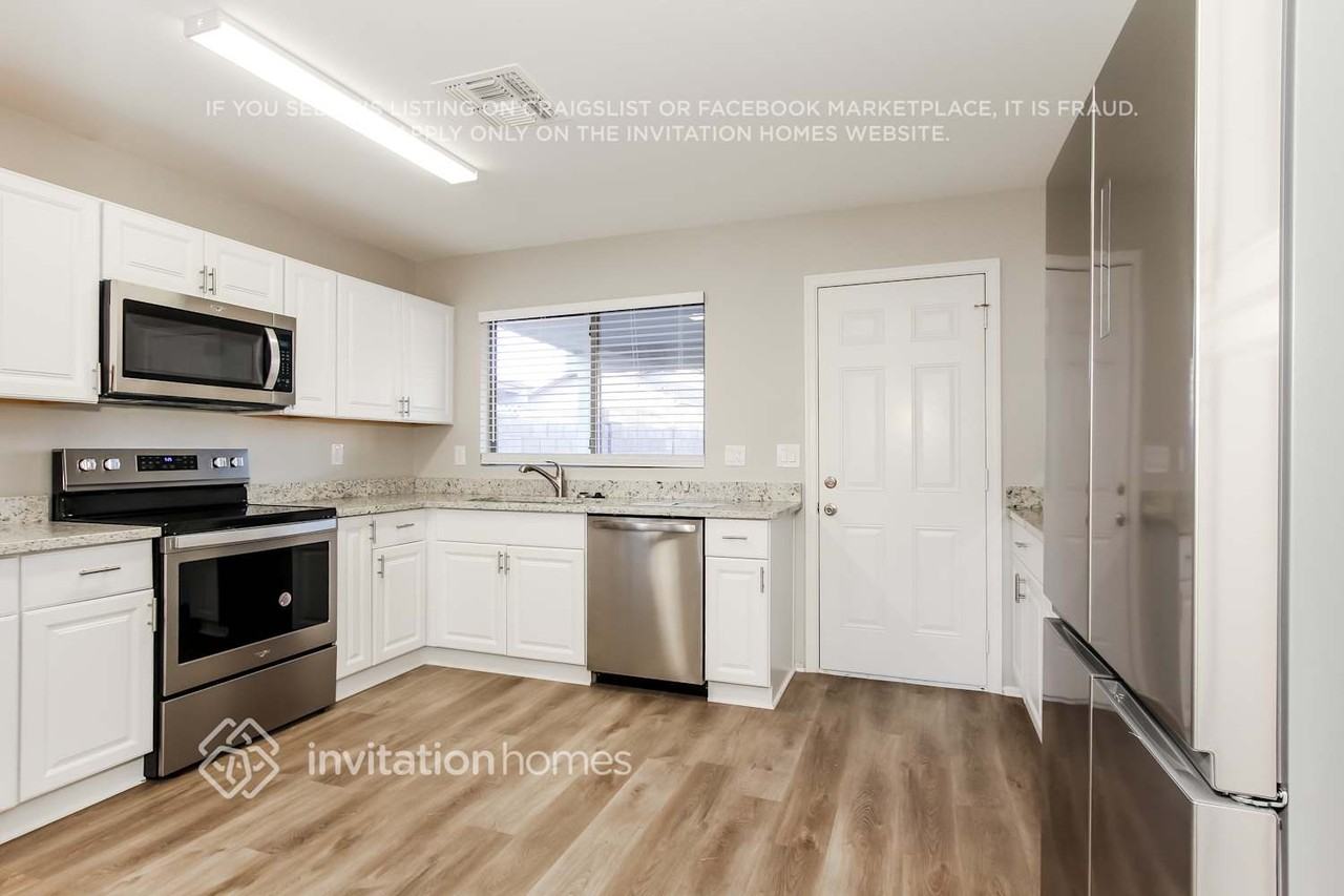 8304 W Baxter Dr - Photo 6 of 16