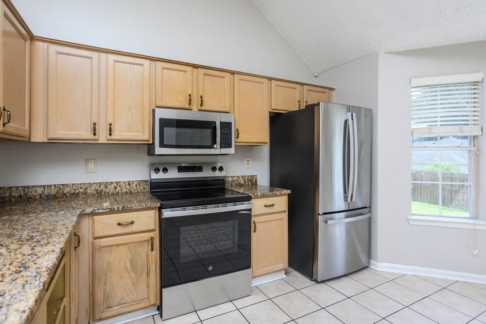 4671 Lindawood Ln - Photo 7 of 16