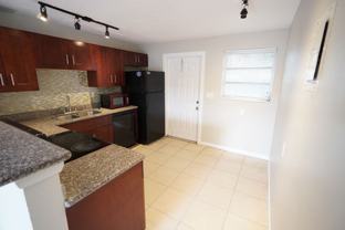 1142 NE 3rd Ave - Photo 1 of 1