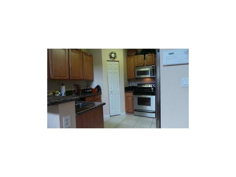 6956 NW 116th Ct - Photo 2 of 5