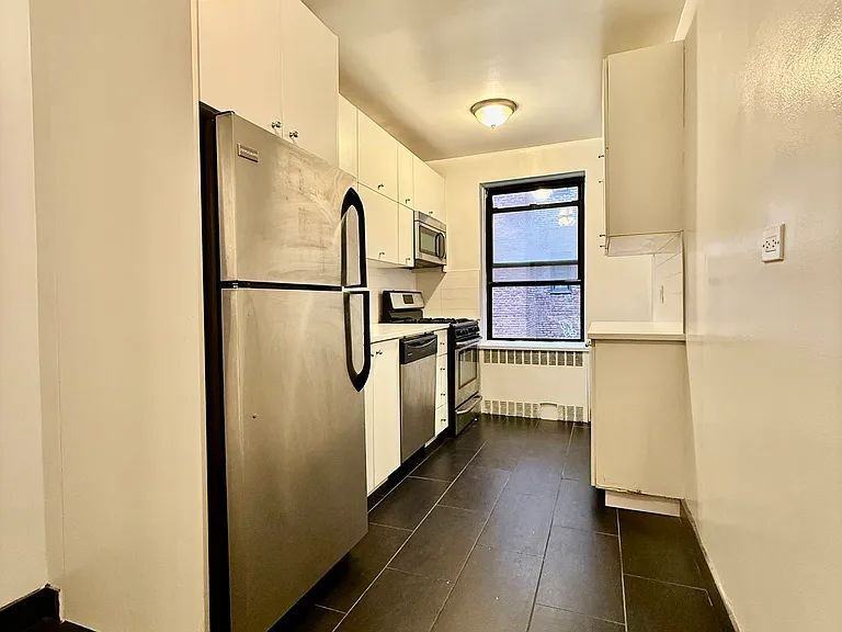 10850 71st Ave - Photo 4 of 5