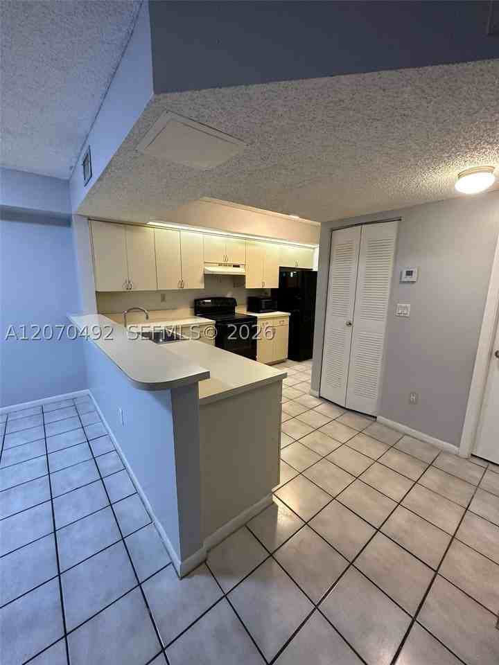 8600 Sw 212th St #105 - Photo 2 of 12