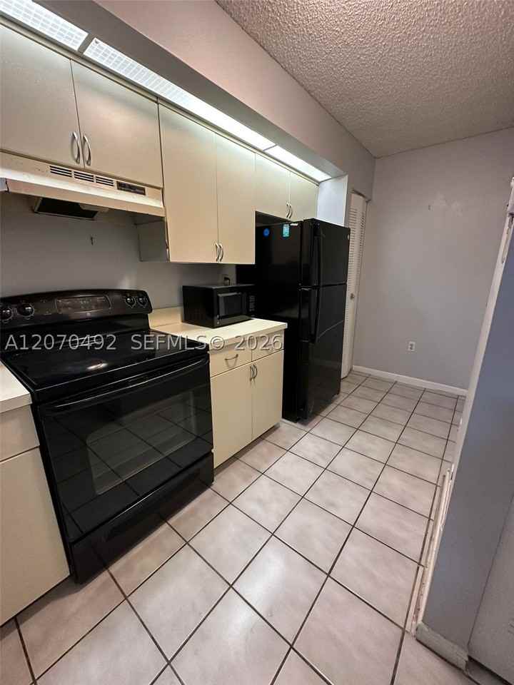 8600 Sw 212th St #105 - Photo 3 of 12