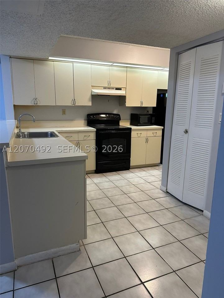 8600 Sw 212th St #105 - Photo 4 of 12