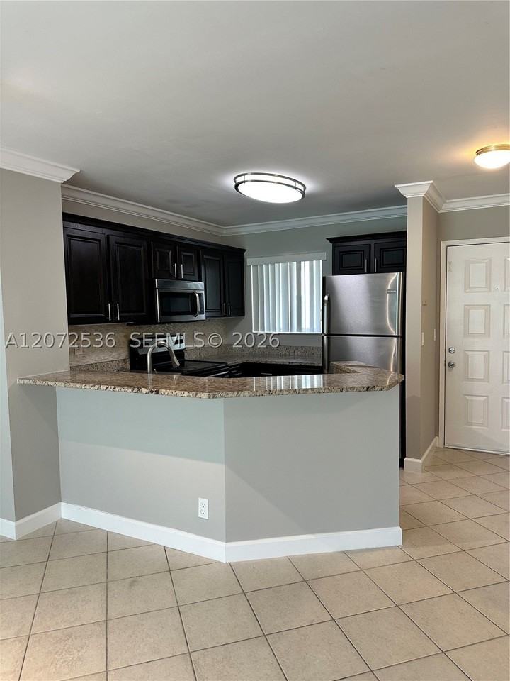 8750 N Sherman Cir #103 - Photo 3 of 14