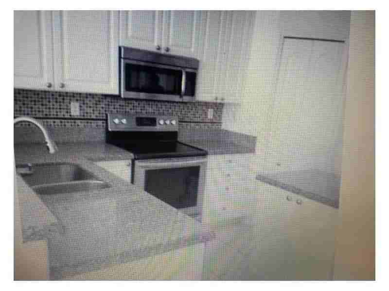 5569 NW 113th Ct - Photo 2 of 4