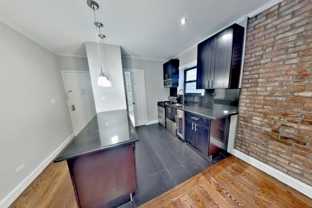436 W 52nd St - Photo 1 of 1