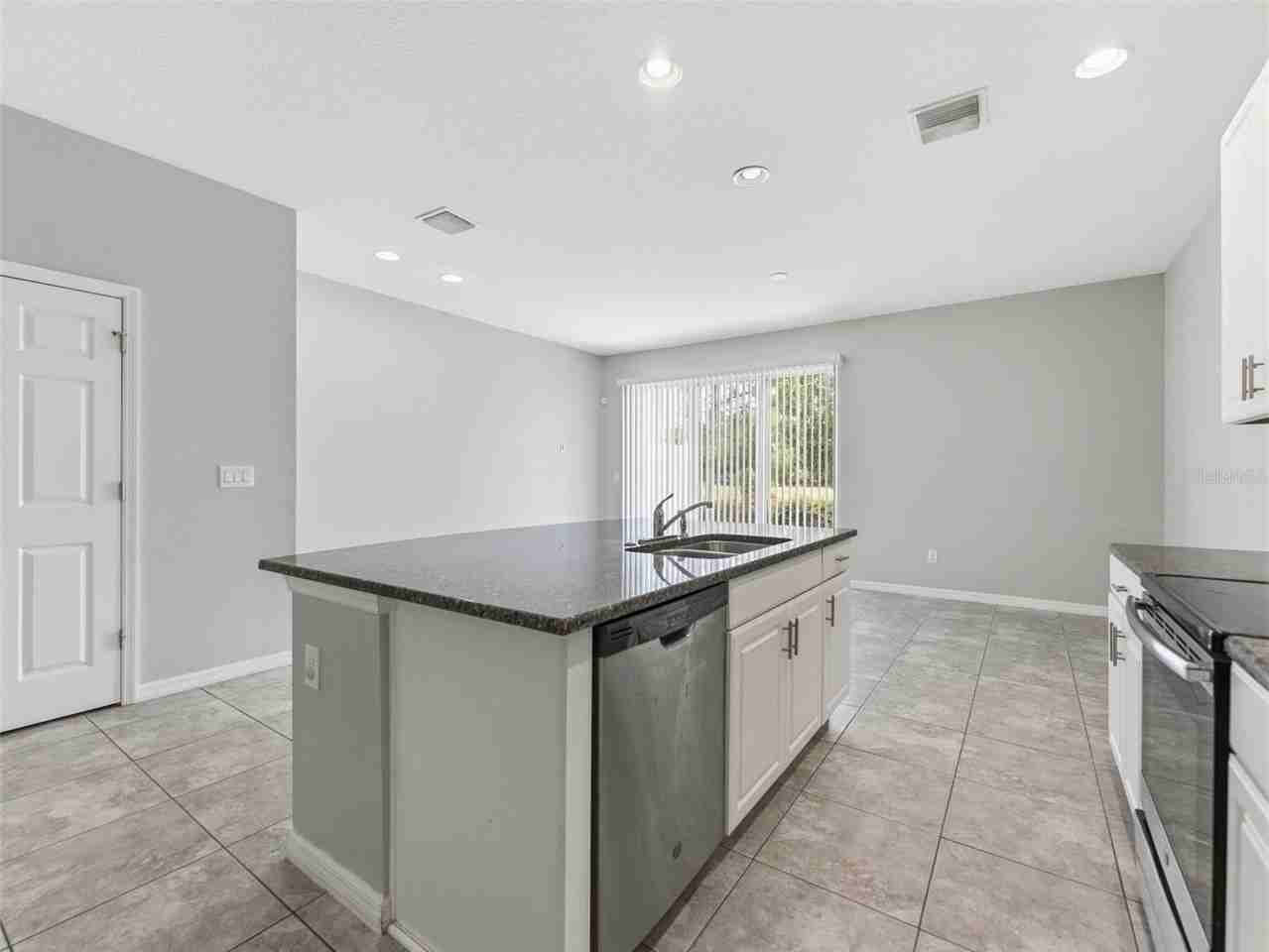 7052 Grand Elm Dr - Photo 5 of 21
