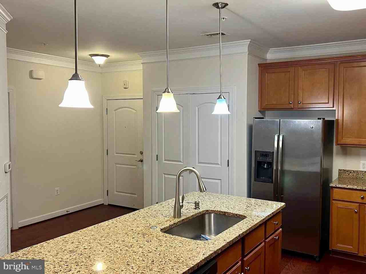 13723 Neil Armstrong Ave #207 - Photo 5 of 15