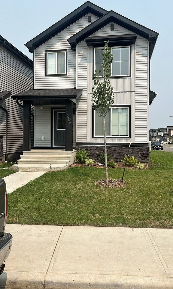 1204 14 Ave Nw - Photo 2 of 4