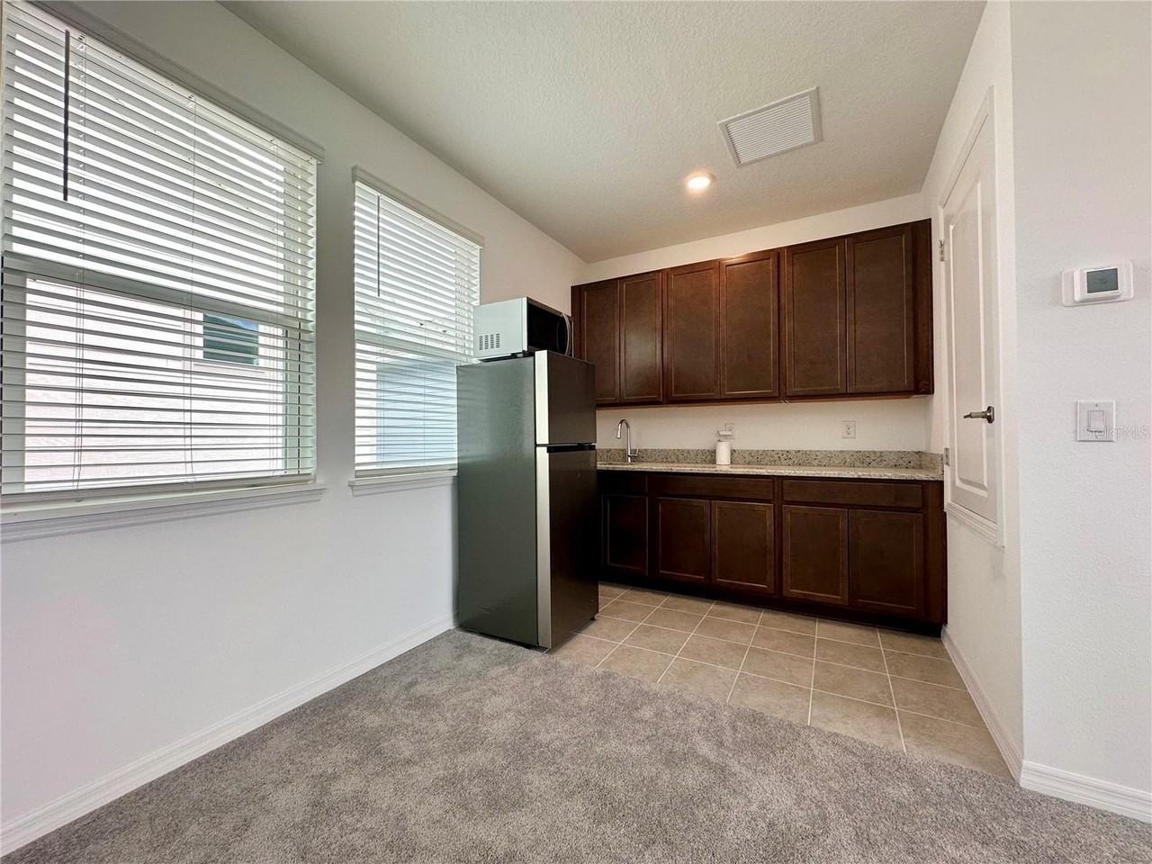 12761 Harvest Rain Ave - Photo 6 of 17
