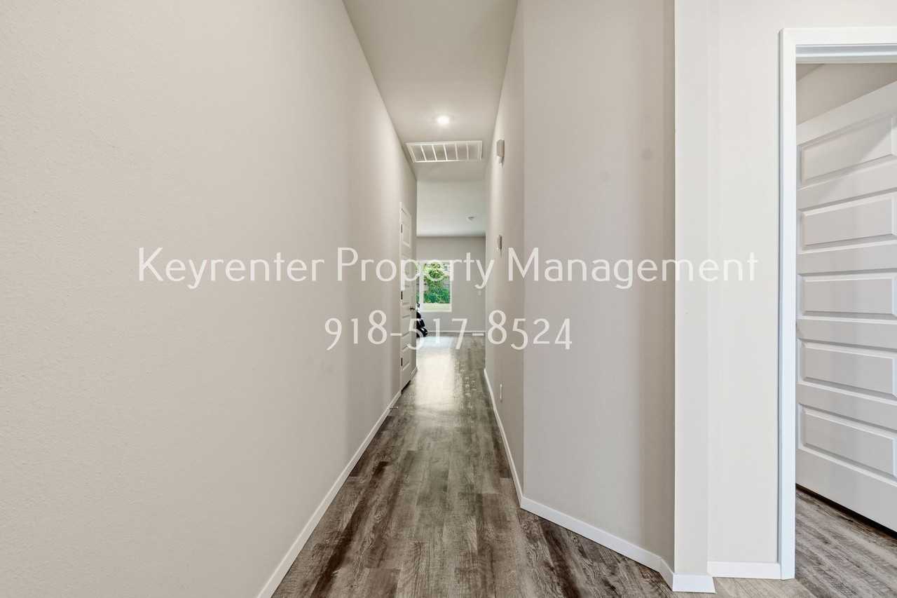 7814 S 290th East Ave - Photo 2 of 21
