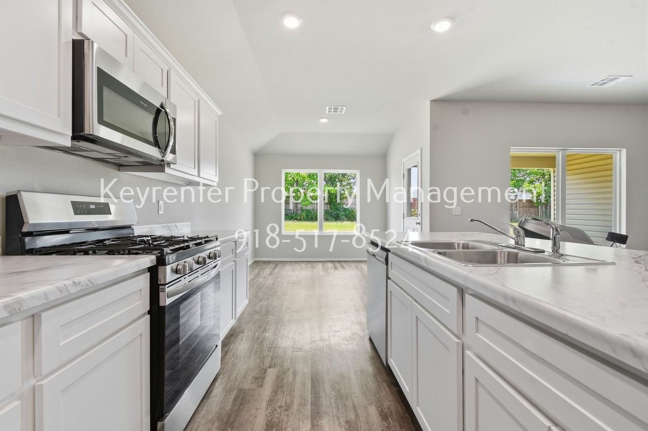 7814 S 290th East Ave - Photo 7 of 21