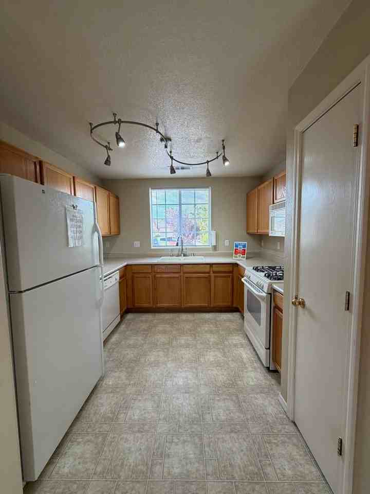 7704 Woodstar Ave Nw - Photo 5 of 29