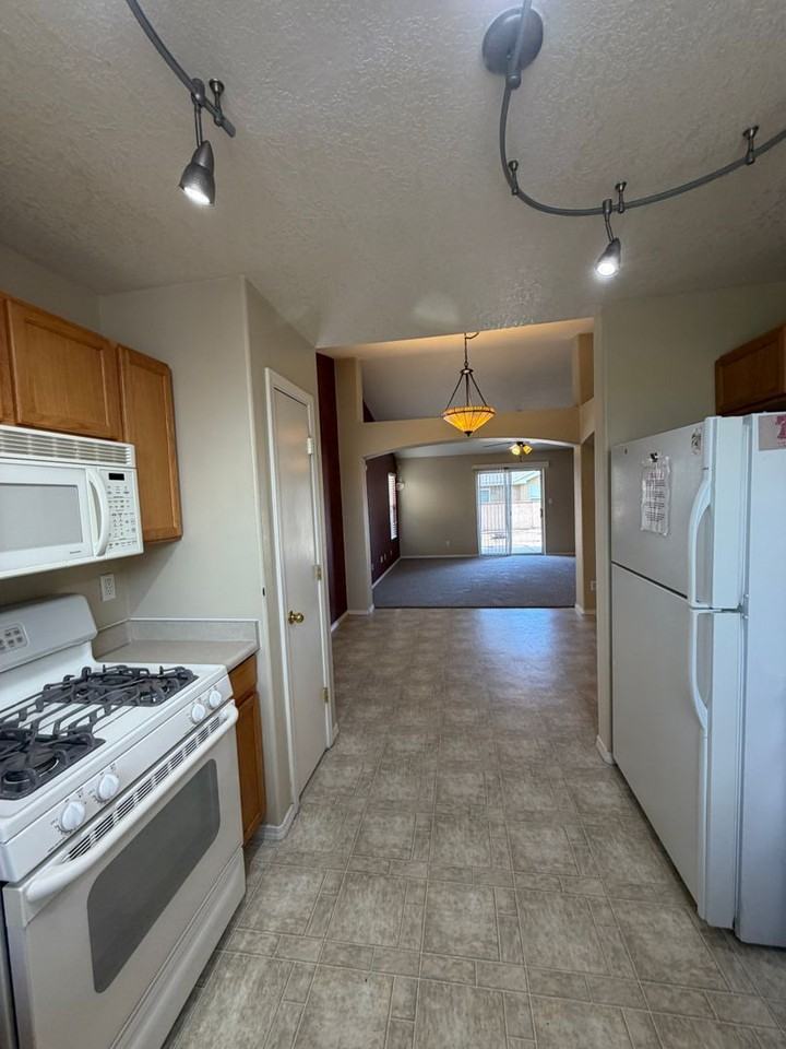 7704 Woodstar Ave Nw - Photo 6 of 29