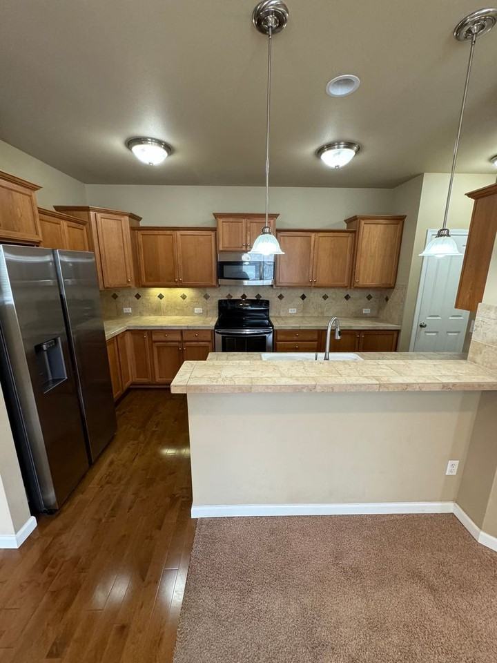 7644 Kodiak Ave Ne - Photo 5 of 13