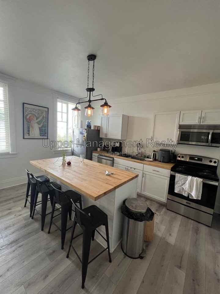 7429 Hampson St #7425-3rdFL - Photo 6 of 16