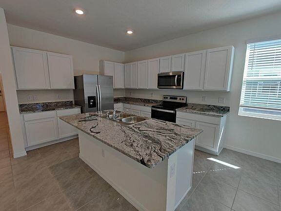 1599 Hubbell Rd - Photo 6 of 28