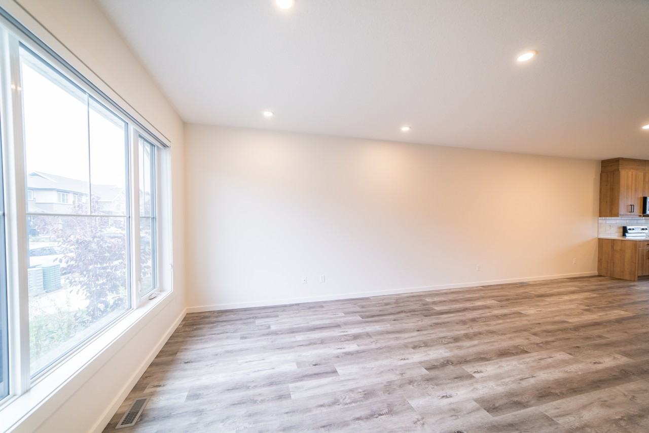 Orchards at Ellerslie Duplexes with Garage & Fenced Yard - Photo 4 of 17