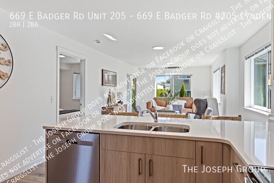 669 E Badger Rd Unit 205 - Photo 5 of 28